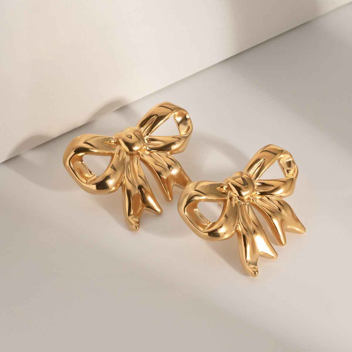 bow earrings - Manika Royale