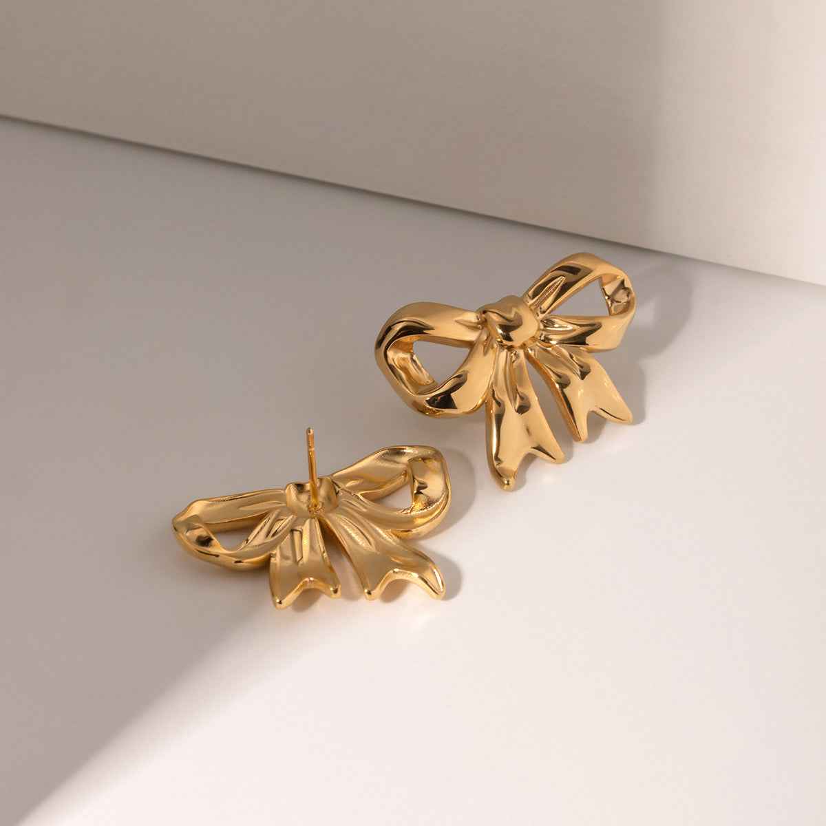bow earrings - Manika Royale