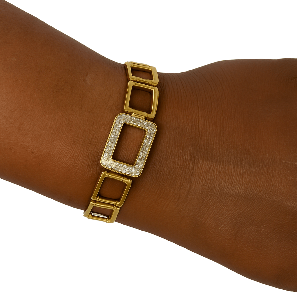 Gold rectangular link bracelet with pavé center detail on wrist