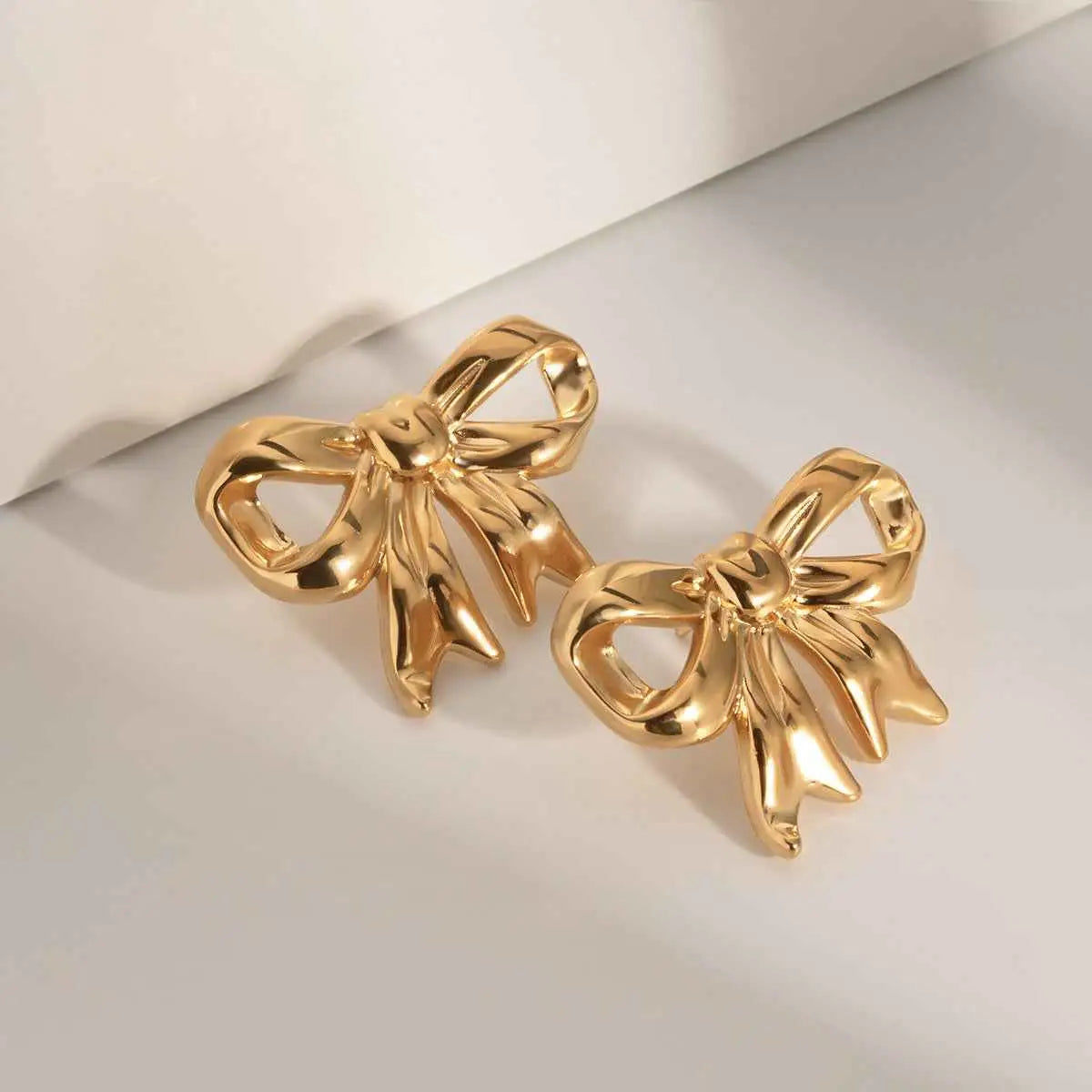bow earrings - Manika Royale