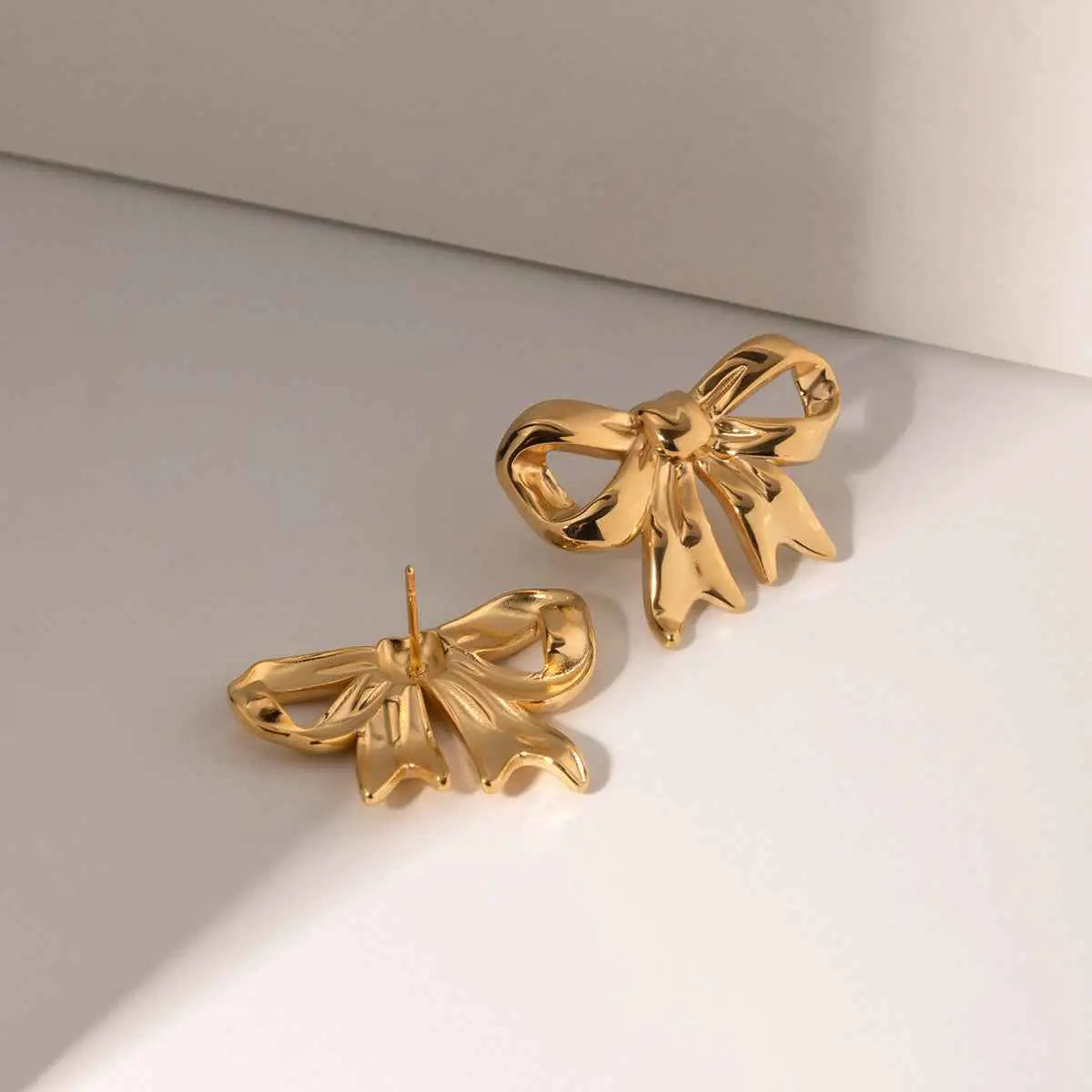 bow earrings - Manika Royale